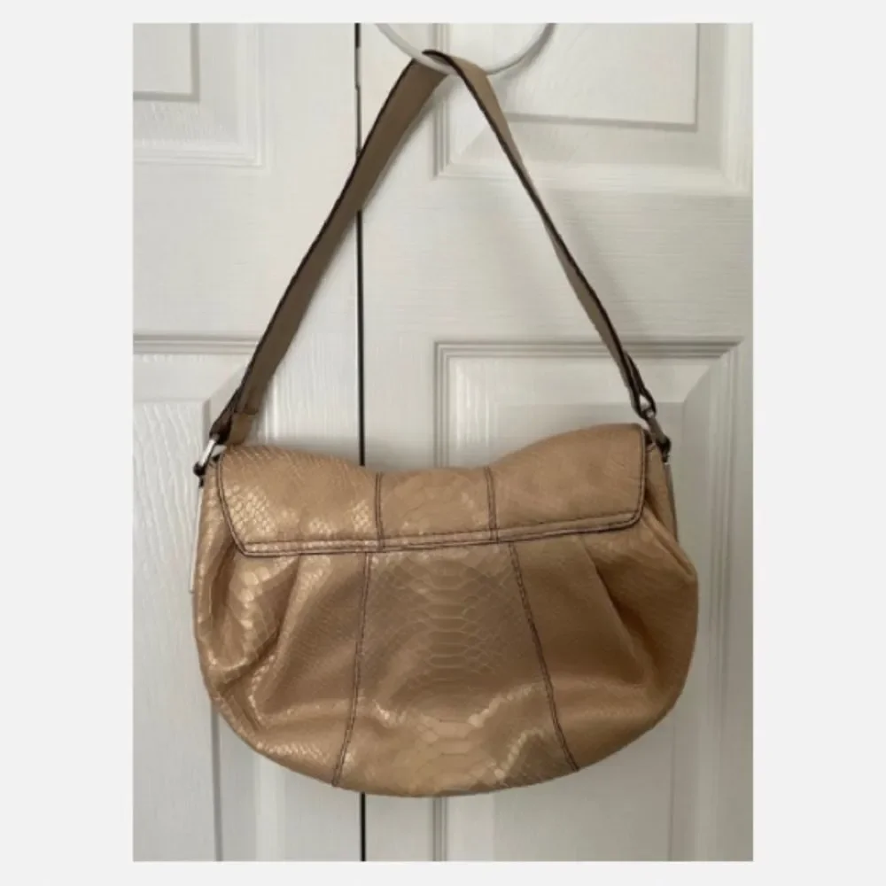 Calvin Klein Vintage Hobo Shoulder Bag with Carved Wood Flap Closure